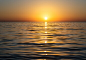 Obraz premium Serene Sunset Over Calm Ocean Waters