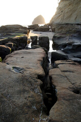 rocks and sea, rocks on the beach, boulders in the ocean
