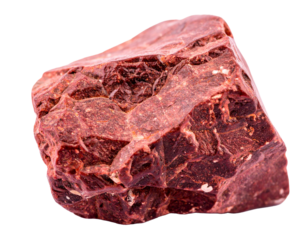 A vibrant red lava rock, with a highly porous and irregular texture, showing the results of rapid cooling, isolated on a white background.