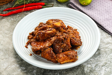 Indian cuisine - Vindaloo fish with spices