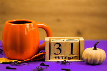 Celebrate October with charming decor, including a delightful pumpkin and a calendar