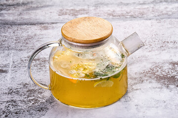 Teapot with orange and mint tea
