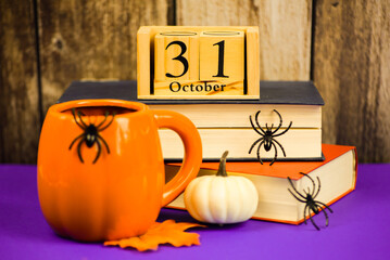 A wooden calendar for October 31st filled with vibrant fall colors and delightful seasonal props.