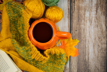 Experience the Cozy Autumn Vibes with a Lovely Pumpkin Mug and Soft Yarn for Relaxation