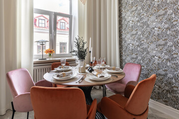 Modern Dining Room with Velvet Chairs and Elegant Tableware