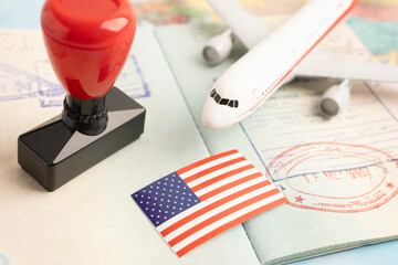 USA passport with approved stamp on document for tourism to immigration at airport in country.