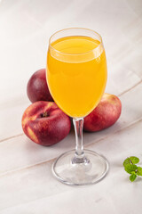 Vitamin beverage - peach juice glass