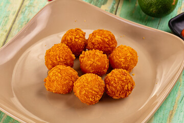 Fried crispy yellow cheese balls