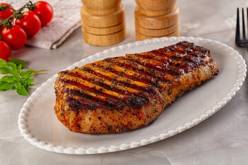 Grilled pork steak with bone