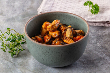 Peeled mussels heap in the bowl