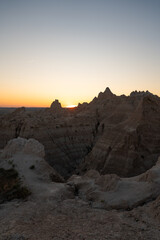 Sunset casting shadows over Badlands peaks