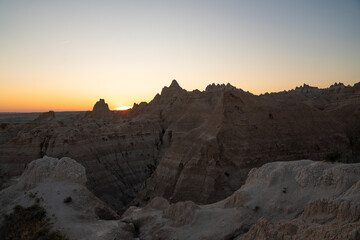 Sunset casting shadows over Badlands peaks