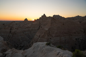 Sunset casting shadows over Badlands peaks