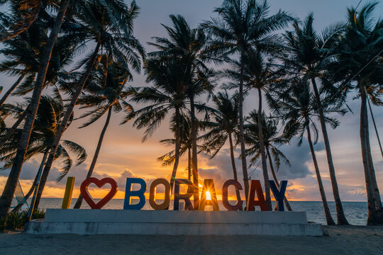 sign on tropical Bulabog Beach, Boracay island, Philippines