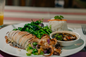 Squid stuffed with stewed vegetables