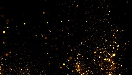 Golden sparkles scattered on a black background