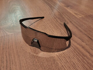 sunglasses on wooden background
