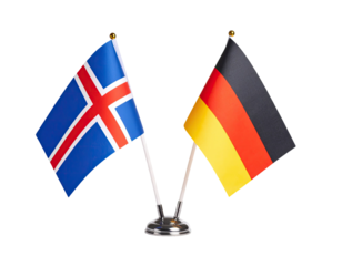 Mini table flags of Iceland and Germany side by side isolated on white background