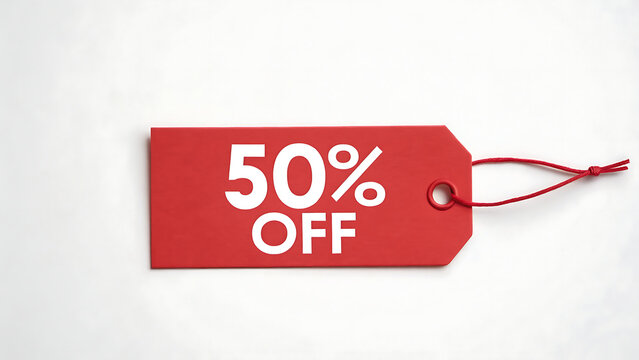 Bright red sale tag announcing fifty percent off promotion against a clean white background with tied string