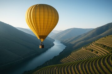 Fototapeta premium Hot air balloon floats over Douro Valley vineyards during sunrise