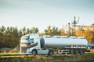 Industrial liquid tanker vehicle on highway