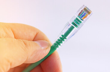 Ethernet cable with Rj45 connector for connecting telecommunications equipment. 