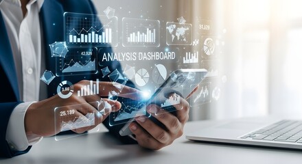 Businessman Analyzing Financial Data on Tablet with Laptop and Overlayed Graphics