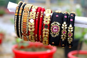 red and gold bracelet isolated on white. red and gold bracelet. background. red background. black...
