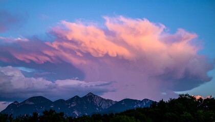 Sunset clouds over mountain range