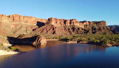 Desert lake, red rock cliffs