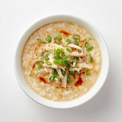 congee with shredded chicken, scallions, and soy sauce