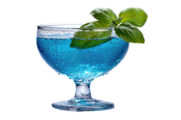 Vibrant blue cocktail in a stemmed glass, garnished with fresh basil leaves