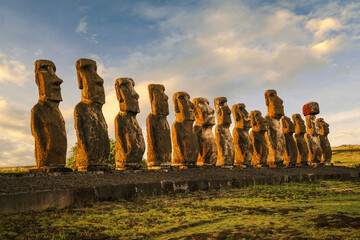 Sun rises over the ceremonial platform (ahu) of Tongariki on Rapa Nui (Easter Island), Chile. It consists of 15 moai statues and is the largest and most important ahu on the island.