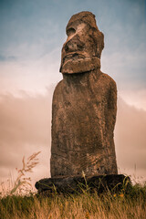 The solitary moai of Ahu Huri a Urenga on Rapa Nui (Easter Island), Chile. It has two pairs of hands likely due to adaptations from wear sustained during transport from the Rano Raraku quarry.