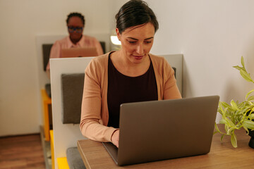 Two female workers working in the cafeteri