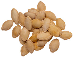 Pumpkin seeds scattered in a handful on a white background, top view, copy space