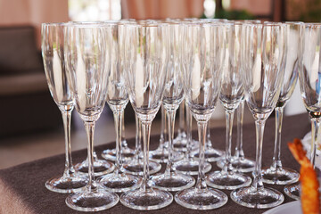 Elegant glassware arranged for a celebratory gathering in a stylish venue