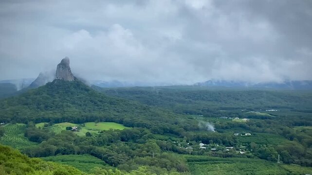 Mount Coonowrin in Mist, Glass House Mountains Queensland Australia. Mountain landscape with clouds