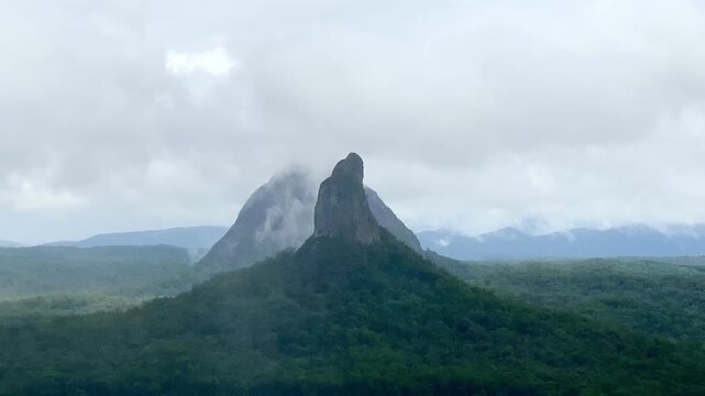 Mount Coonowrin in Mist, Glass House Mountains Queensland Australia. Mountain landscape with clouds