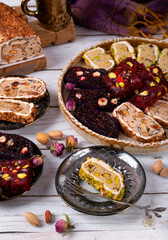 Sliced ​​Turkish delight assortment with cream filling, pistachio, almond, hazelnut, figs and...