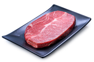 Raw premium Wagyu beef steak isolated on Black plate on white background with clipping path high-quality meat cut for gourmet cooking and fine dining PNG file.
