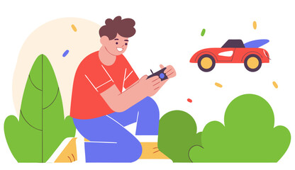 Boy kneeling on the floor, smiling and playing with a remote control car. The car is in motion with playful movement lines