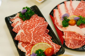 Raw Beef being grilled in Japanese Yakiniku grill