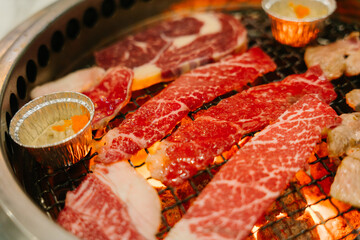 Raw Beef being grilled in Japanese Yakiniku grill