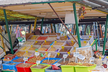 Dry Fruits and Mix Nuts in Bulk Tubs at Farmers Market Stall