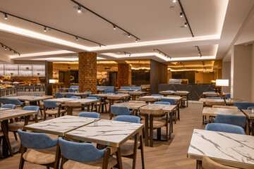 Interior of a large modern hotel restaurant