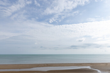 Peaceful landscape with a sandy shoreline, calm sea waters, Caspian Sea coast