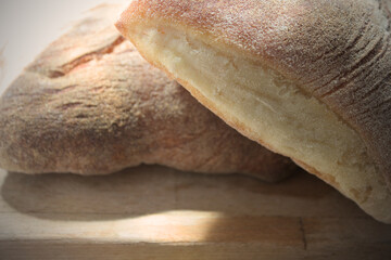 Rustic bread on a wooden cutting board