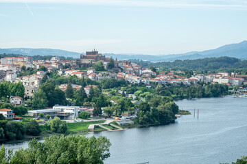 Obraz premium The Tui Cathedral overlooking the Mino River on the border of Portugal european landscape concept