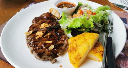 steak and vegetables